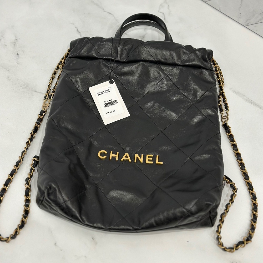 CHANEL Chanel Black Shiny Quilted Leather 22 Backpack
